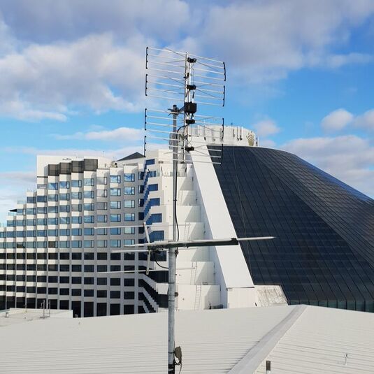 Multi media antenna on rooftop of hotel